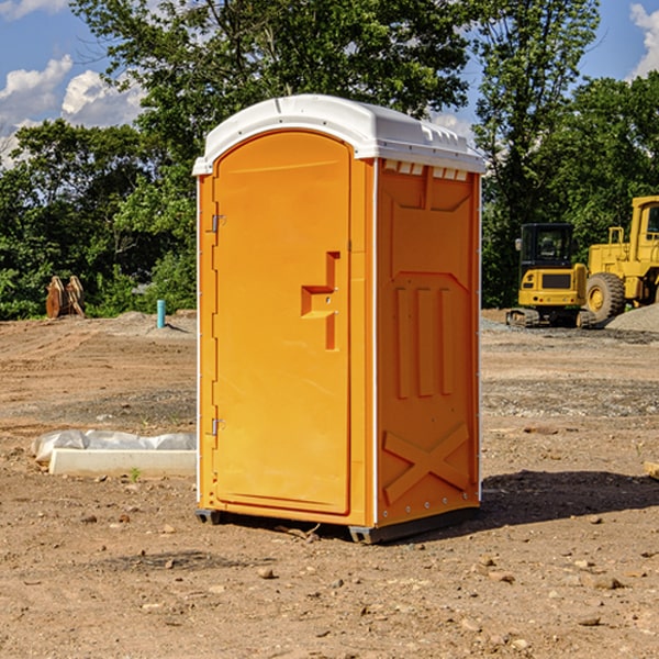 how often are the portable restrooms cleaned and serviced during a rental period in Godwin NC